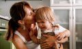 Young,Mother,Tries,To,Calm,Her,Crying,Little,Daughter.,Raising