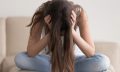 Depressed,Teenager,Sitting,Holding,Head,In,Hands,,Stressed,Sad,Young